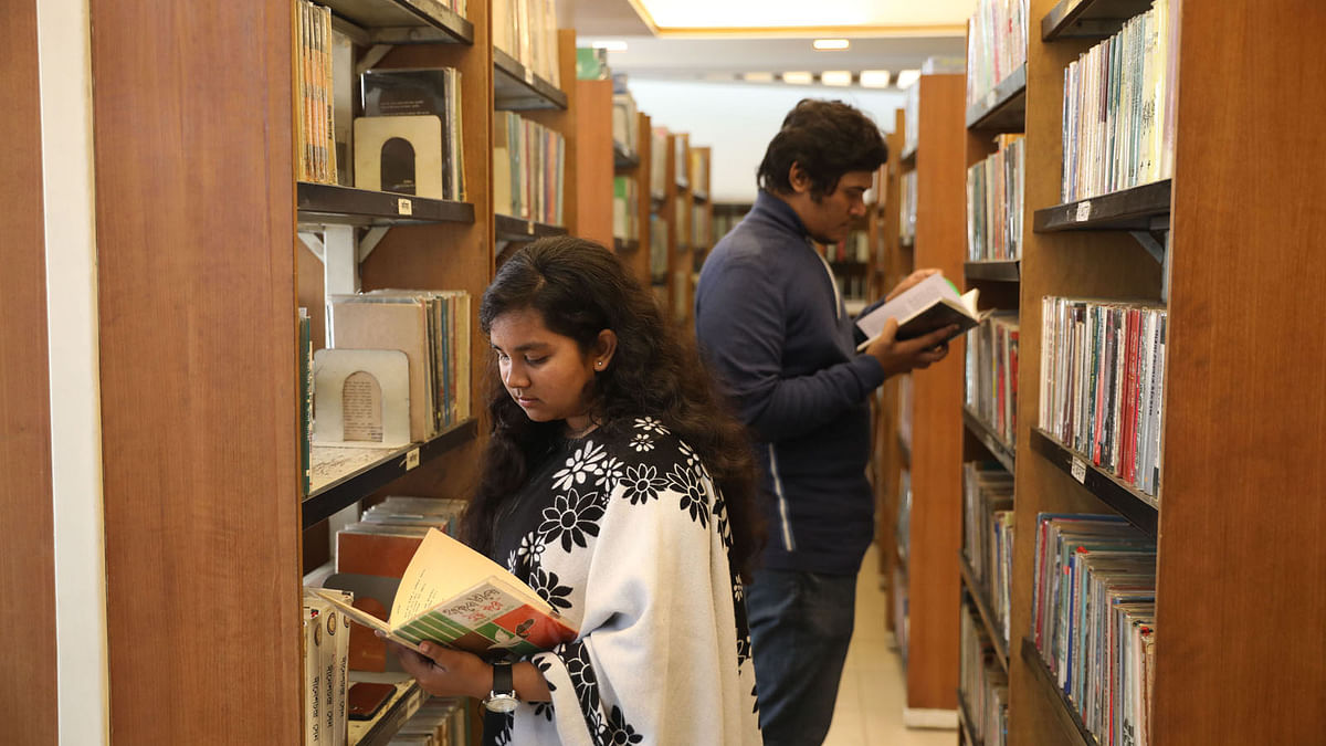 Visitors browse books at Bishwa Sahitya Kendra, a non-profit institution to promote reading habits among the people, in the capital`s Banglamotor area on 5 January 2019. Photo: Abdus Salam