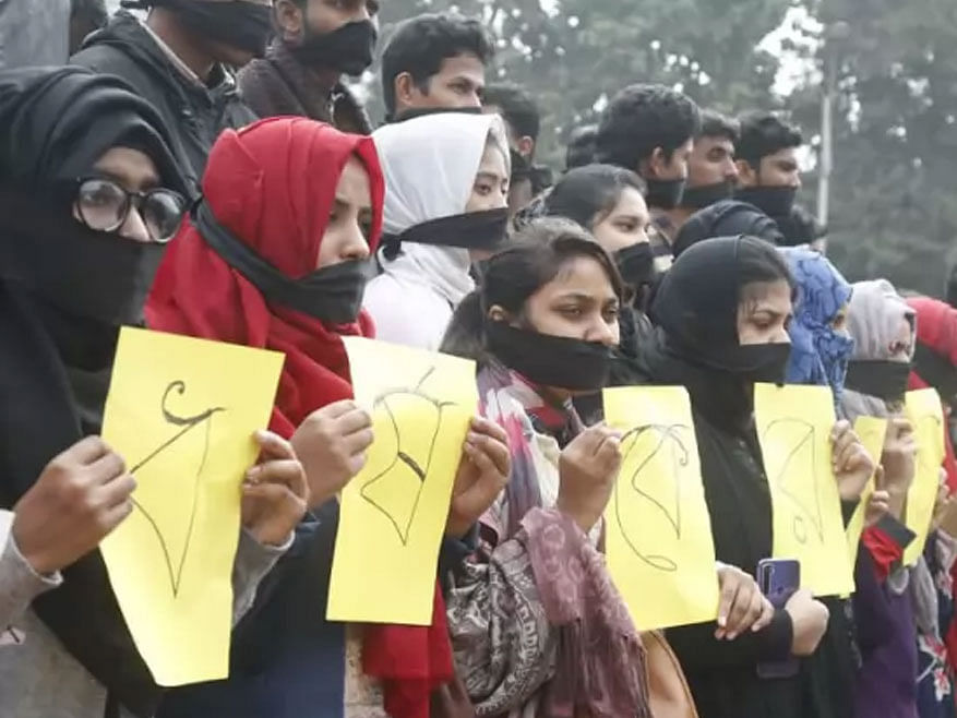 The protesting students, with a piece of black cloth on their faces, were holding different placards seeking justice for their fellow. Photo: Sajid Hossain