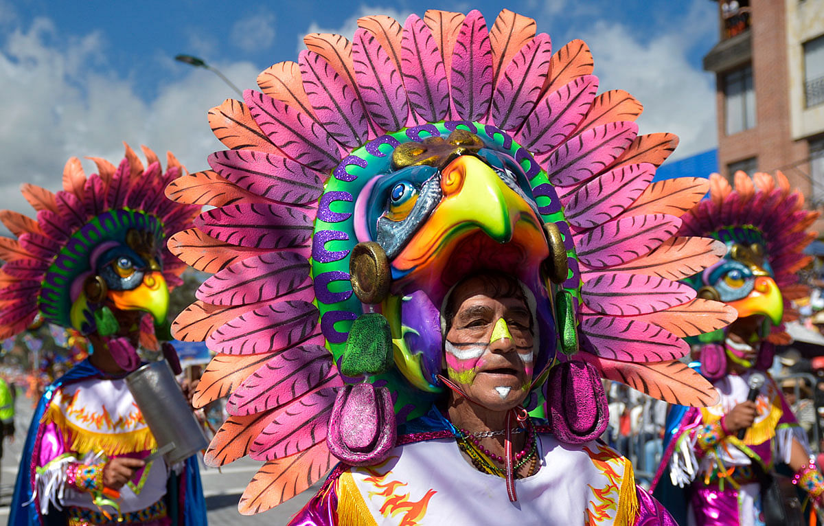 Revellers take part in the `White Day` parade, on 6 January 2020, during the Carnival of Blacks and Whites in Pasto, Colombia, the largest festivity in the south-western region of the country. Photo: AFP