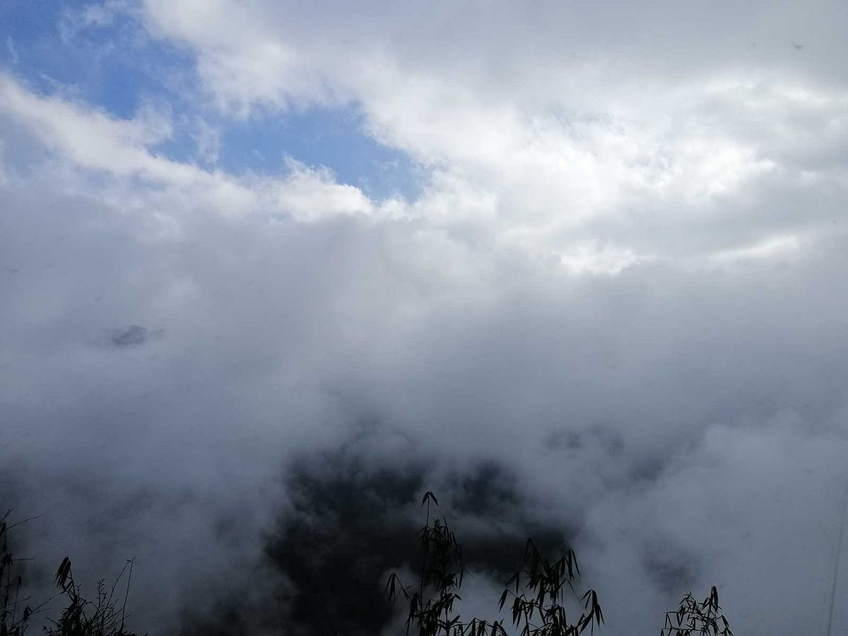 Clouds cover the mountain. Photo: Toriqul Islam