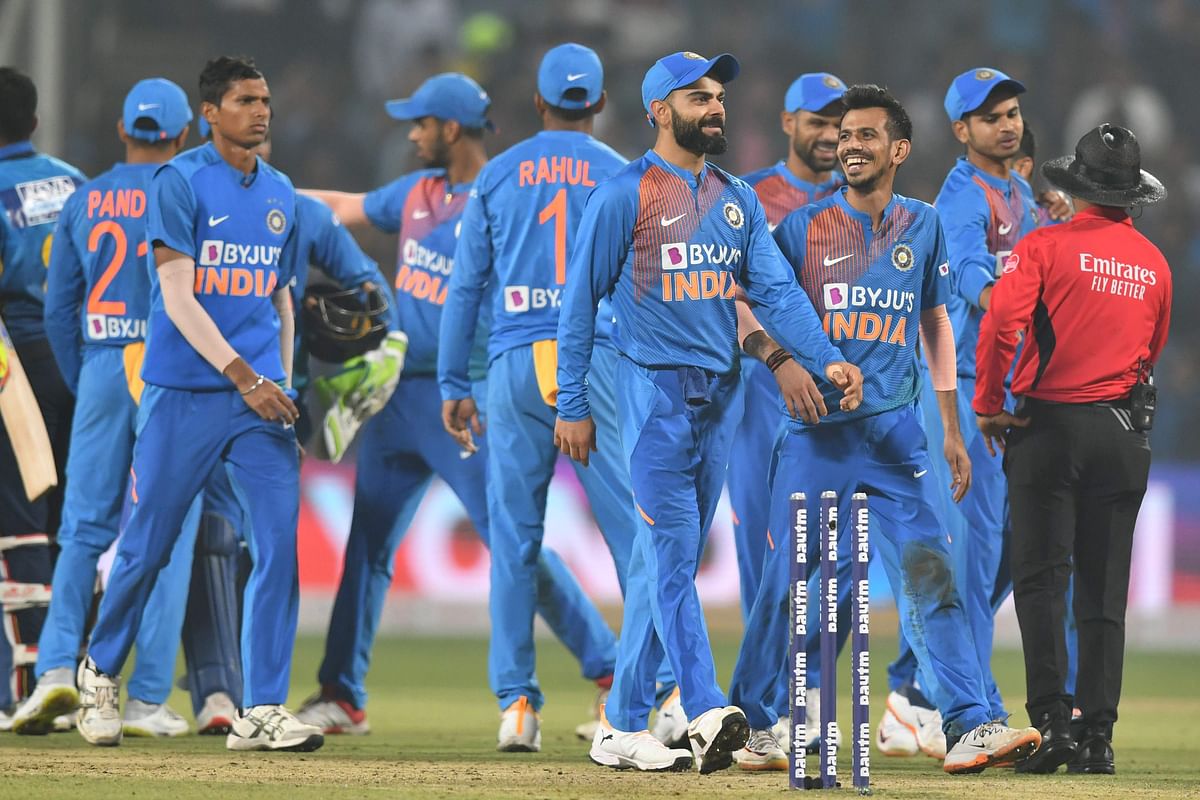 India`s players celebrate after winning the third T20 cricket match against Sri Lanka at the Maharashtra Cricket Association stadium in Pune on 10 January 2020. Photo: AFP
