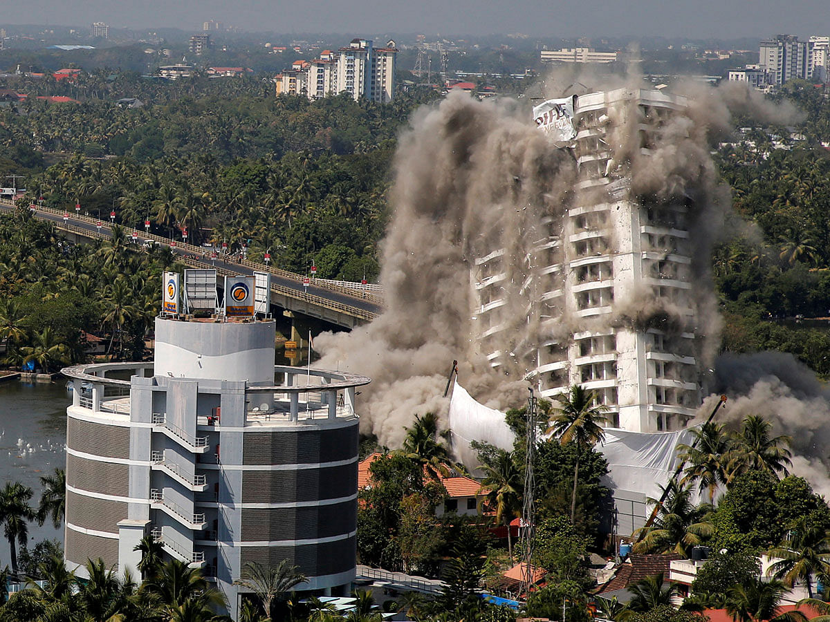 A high-rise residential building is demolished with controlled blasting which, according to authorities, was built in violation of the Coastal Regulation Zone (CRZ) norms, in Kochi, India, on 11 January 2020. Photo: Reuters