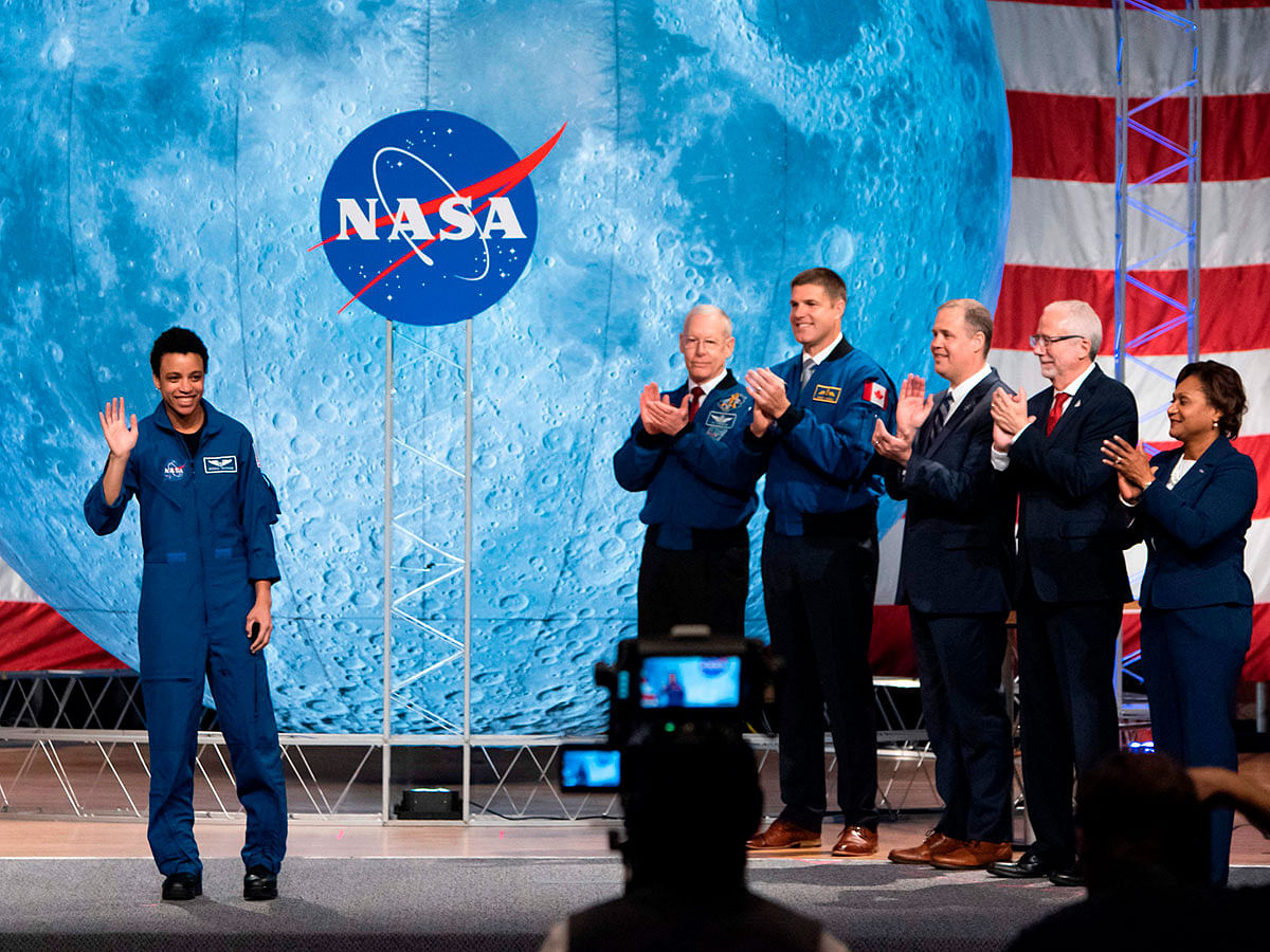 NASA astronaut Jessica Watkins (L) waves at the audience during during the astronaut graduation ceremony at Johnson Space Center in Houston Texas, on 10 January 2020. Photo: AFP