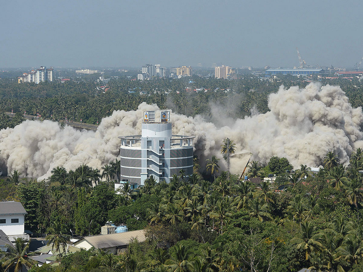 An apartment complex is pictured during a controlled implosion ordered by the Supreme Court for violating coastal construction regulations in Kochi on 11 January 2020. Photo: AFP