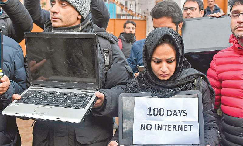 Kashmiri journalists display laptops during a protest demanding restoration of internet service on 12 November, 2019. Photo: AFP  India`s Supreme Court says indefinite Kashmir internet shutdown is illegal