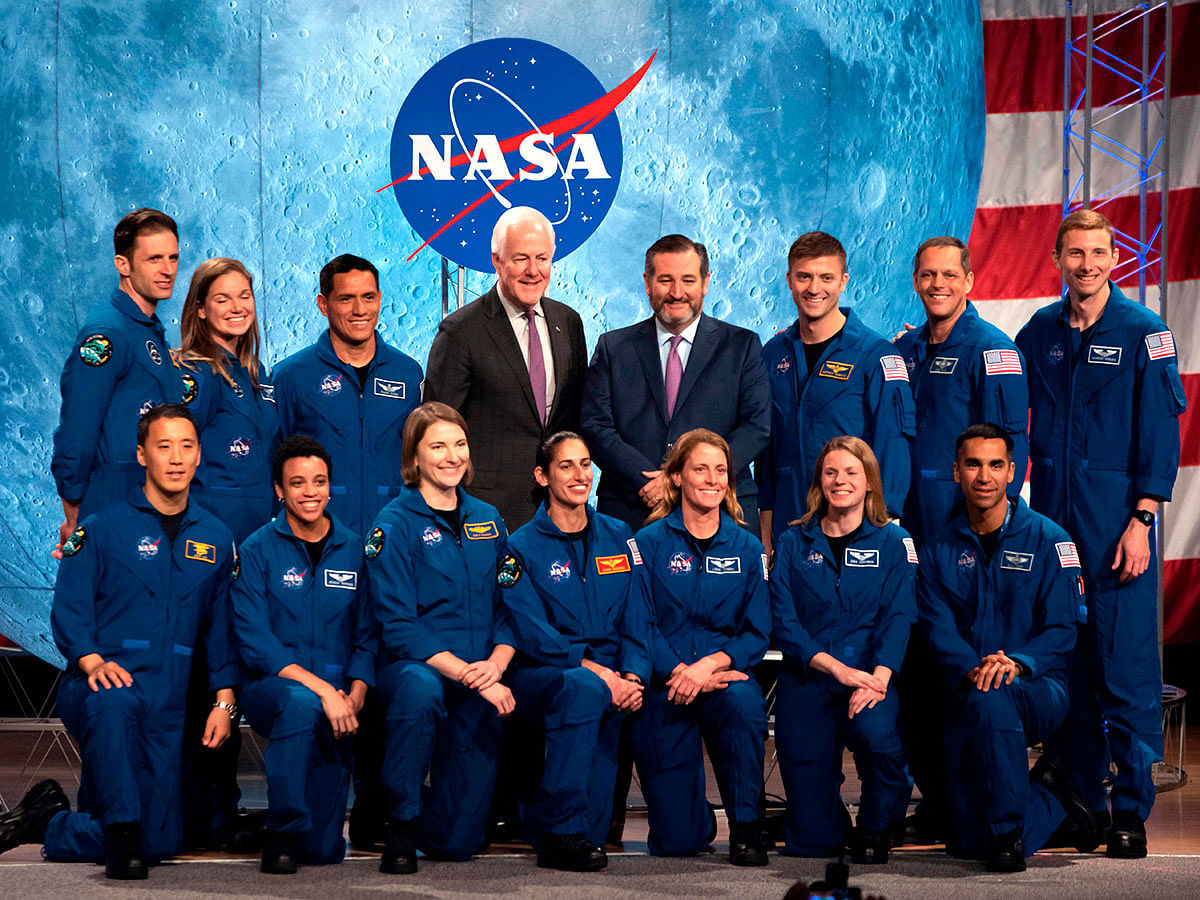 US Senators Ted Cruz (C-R) and John Cornyn (C-L) pose with Nasa and Canadian Space Agency graduating astronauts during the ceremony at Johnson Space Center in Houston Texas, on 10 January 2020. Photo: AFP