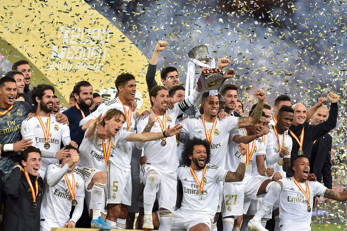 Real Madrid`s players celebrate after winning the Spanish Super Cup final between Real Madrid and Atletico Madrid on 12 January, 2020, at the King Abdullah Sports City in the Saudi Arabian port city of Jeddah. Photo: AFP
