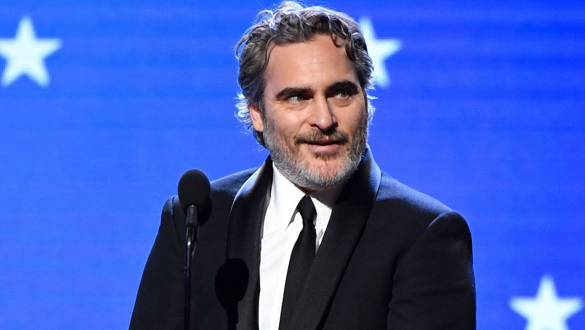 Joaquin Phoenix accepts the Best Actor award for `Joker` onstage during the 25th Annual Critics` Choice Awards at Barker Hangar on 12 January in Santa Monica, California.Photo: AFP