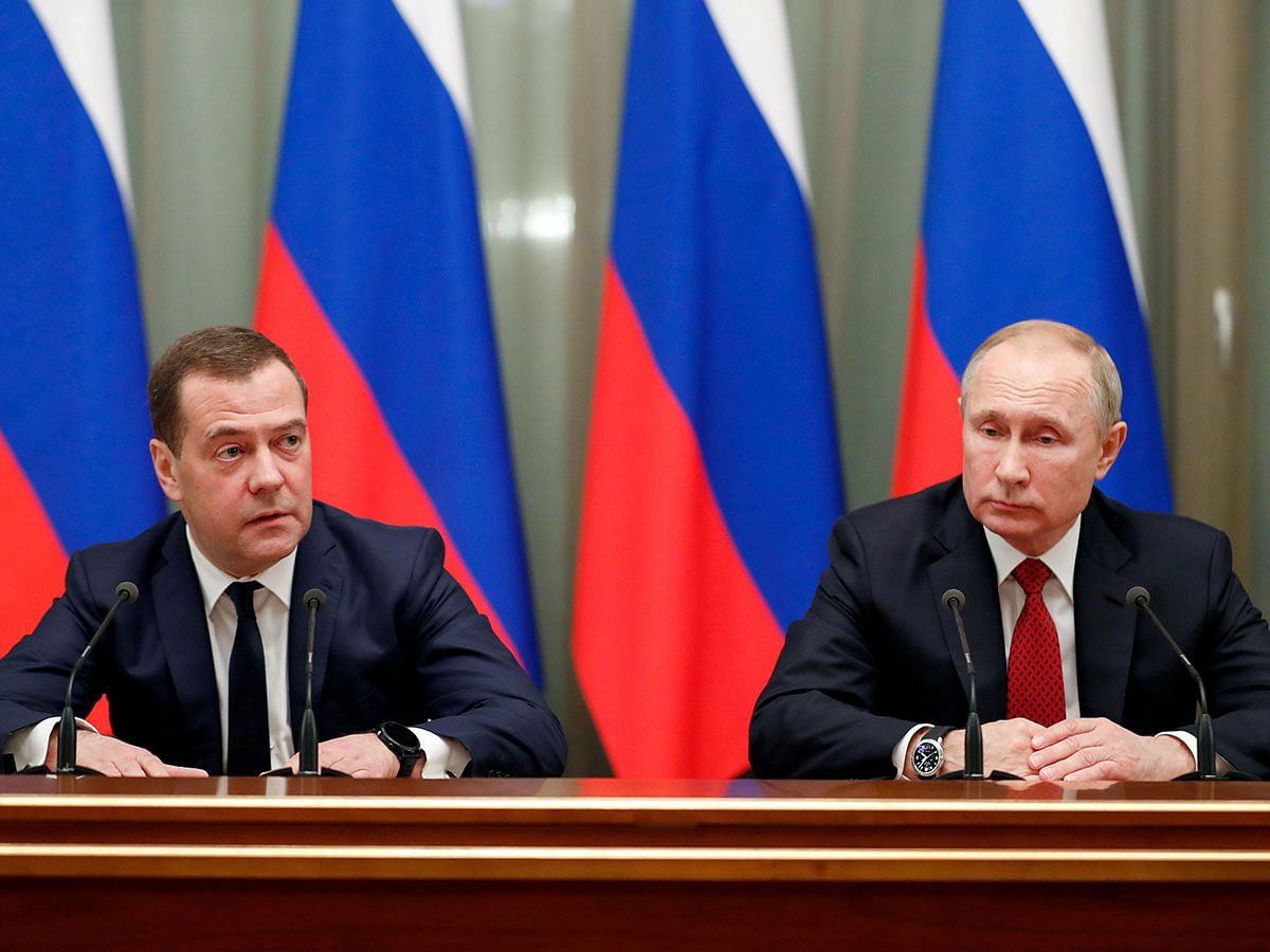 Russian president Vladimir Putin and prime minister Dmitry Medvedev meet with members of the government in Moscow on 15 January, 2020. The Russian government resigned on Wednesday after president Vladimir Putin proposed a series of constitutional reforms, Russian news agencies reported. Photo: AFP