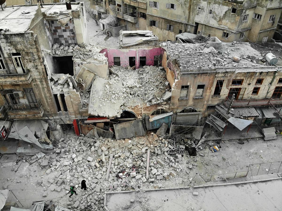 An aerial view shows a destroyed building following a regime air strike on Ariha town in Syria`s last major opposition bastion of Idlib on 15 January 2020. Photo: AFP