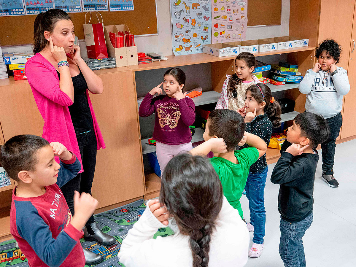 The teacher Katrin Baminger is teaching a special German language class for recently arrived migrant children at Felbigergasse elementary school in Vienna, Austria on 3 December 2019. Photo: AFP