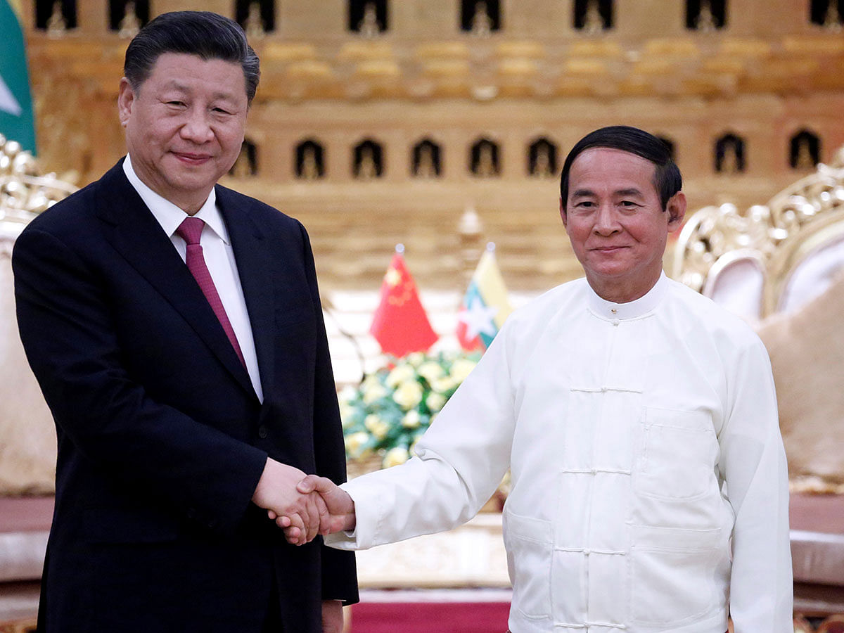 Chinese president Xi Jinping and Myanmar president Win Myint shake hands at the Presidential Palace in Naypyitaw, Myanmar on 17 January 2020. Photo: Reuters