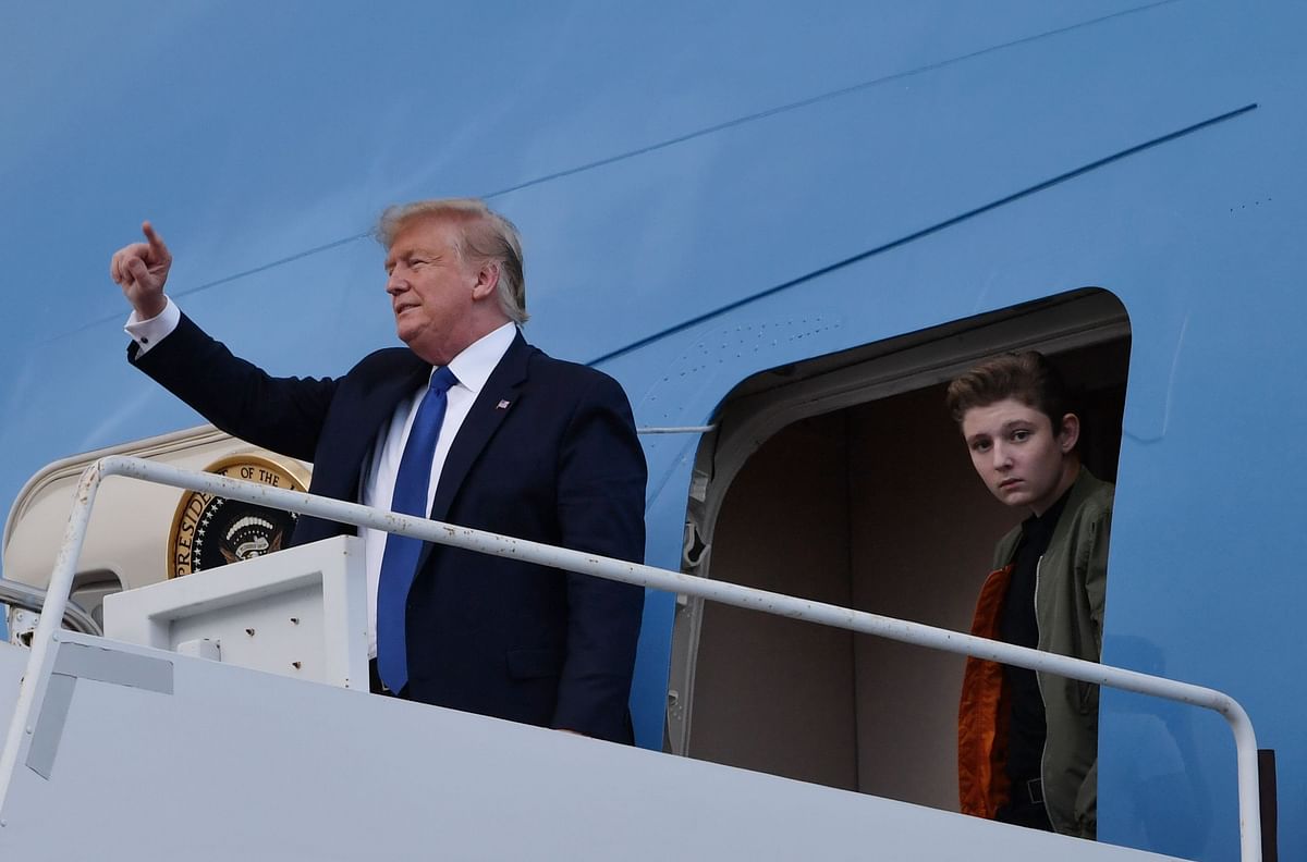 US president Donald Trump and son Barron Trump arrive at Palm Beach International Airport in West Palm Beach, Florida on 17 January 2020. Photo: AFP