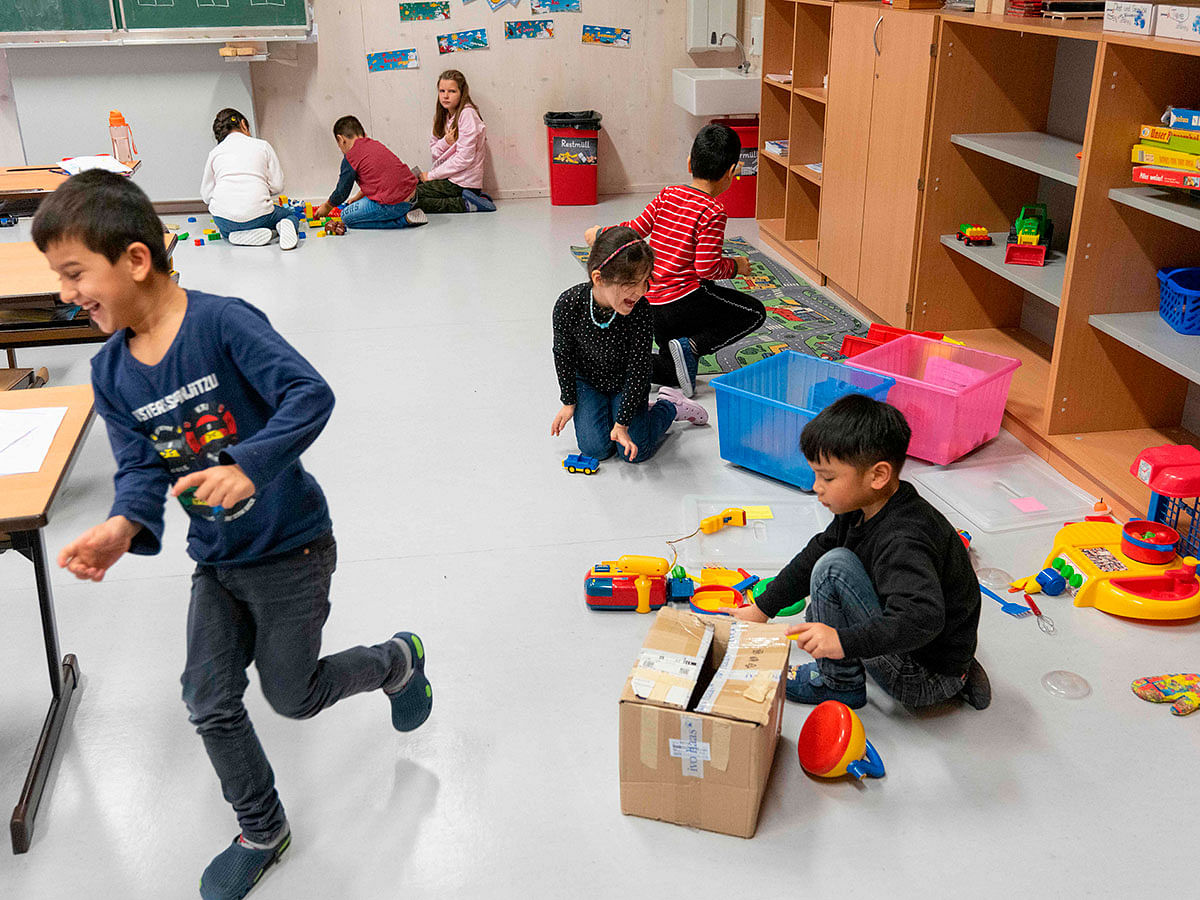 Children participate in a special German language class for recently arrived migrant children at Felbigergasse elementary school in Vienna, Austria on 3 December 2019. Photo: AFP