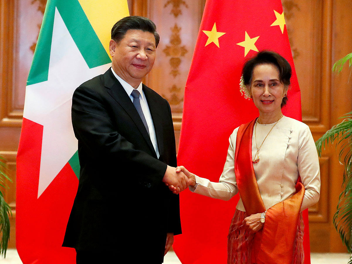 Myanmar State Counselor Aung San Suu Kyi shakes hands with Chinese president Xi Jinping at the Presidential Palace in Naypyitaw, Myanmar, on 18 January 2020. Photo: Reuters