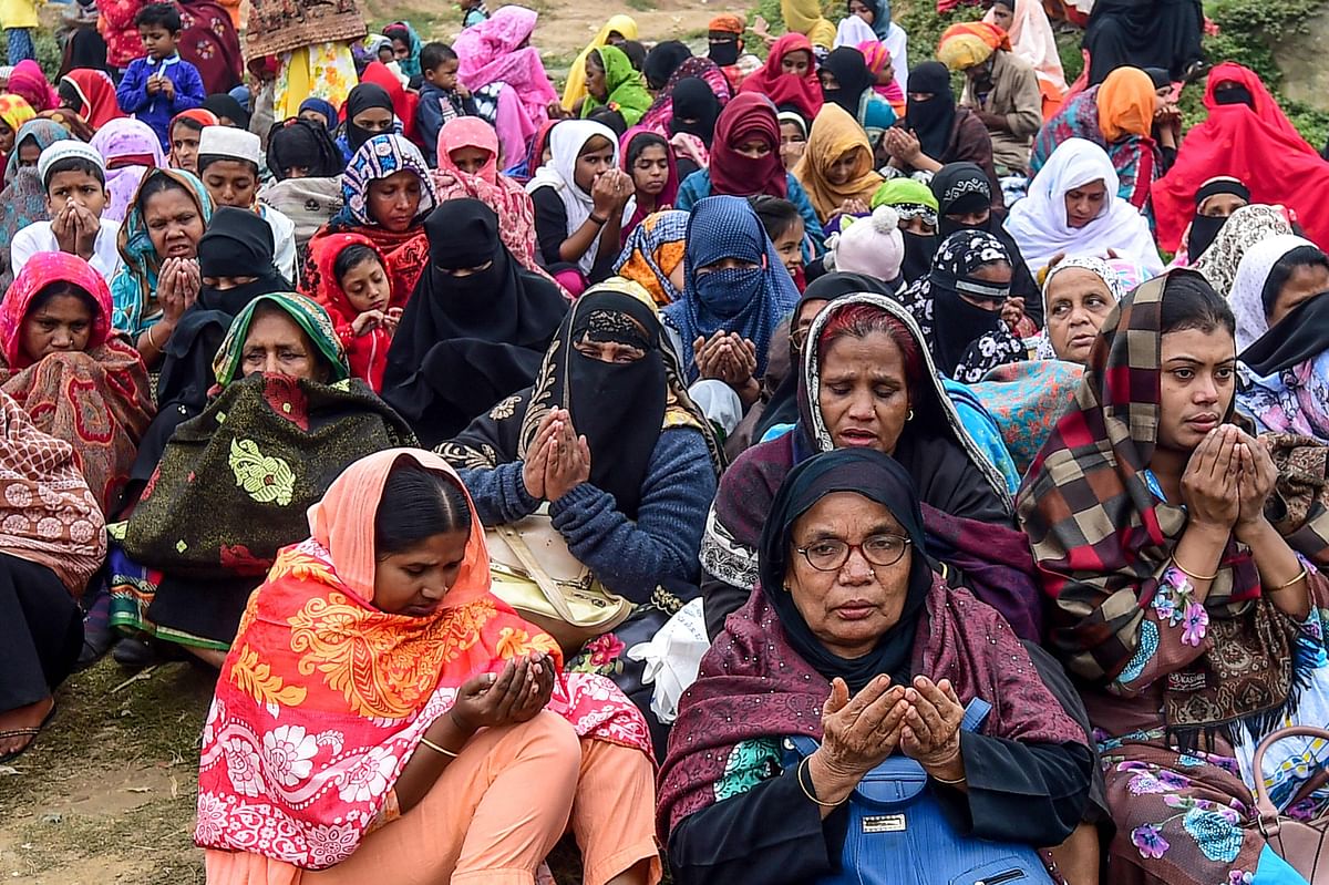 Muslim devotees take part in the Akheri Munajat, or final prayers, during the first phase of annual Muslim gathering `Bishwa Ijtema` in Tongi, some 30 kms north of Dhaka on 12 January 2020. Photo: AFP