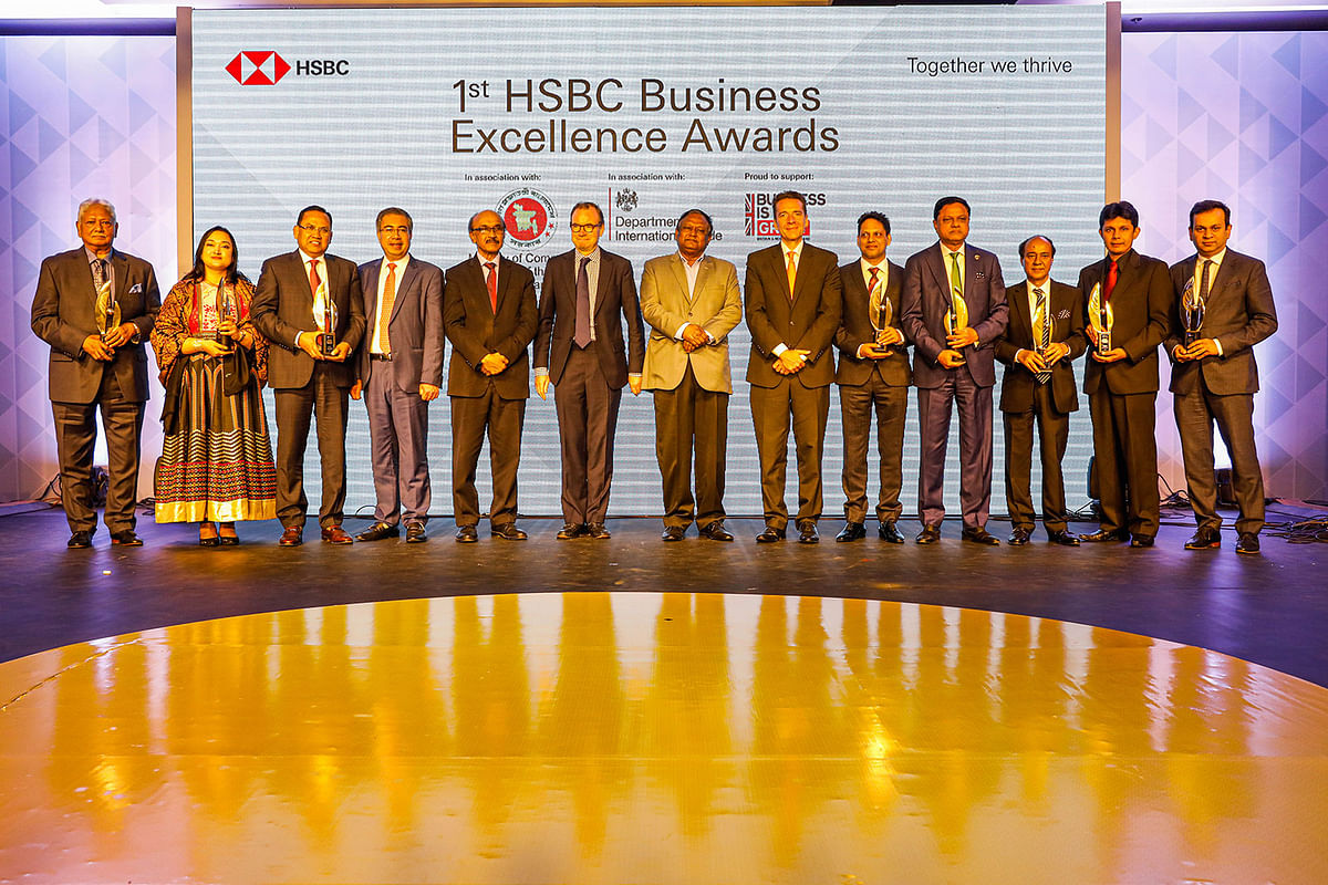 Awardees and guests pose during a photo call at HSBC Business Excellence Award at Hotel Radisson Blue, Dhaka, on 18 January 2020. Photo: Prothom Alo