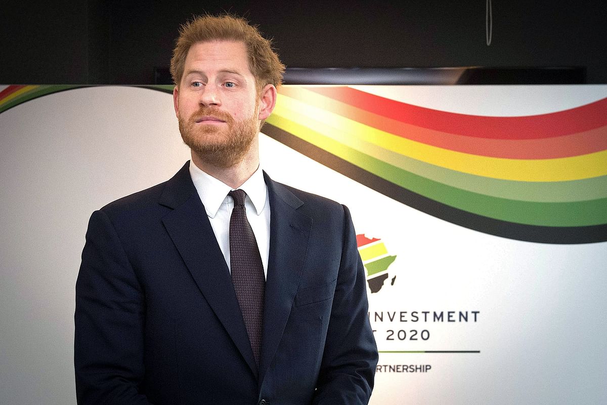 Britain`s prince Harry reacts as he waits to greet a guest during the UK-Africa Investment Summit in London on 20 January. Photo: AFP