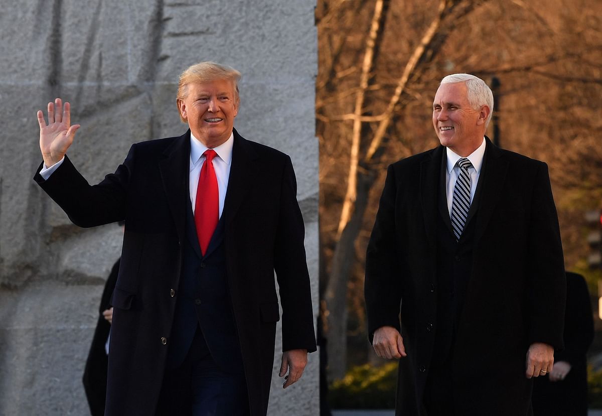 US president Donald Trump and US vice president Mike Pence arrive at the Martin Luther King junior memorial on MLK day in Washington, DC on 20 January. Photo: AFP