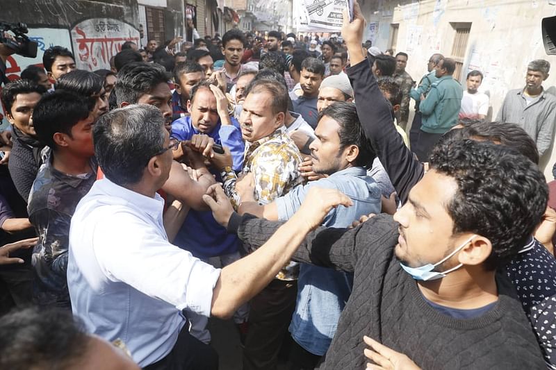 Tabith Awal (in purple) along with his supporters were allegedly attacked during campaign at Gabtali, Dhaka on 21 January 2020. Photo: Ashraful Alam