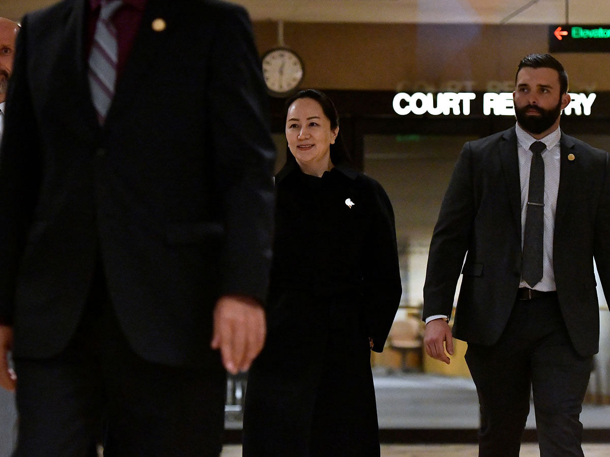 Huawei CFO Meng leaves BC Supreme Court during her extradition hearing in Vancouver. Photo: Reuters