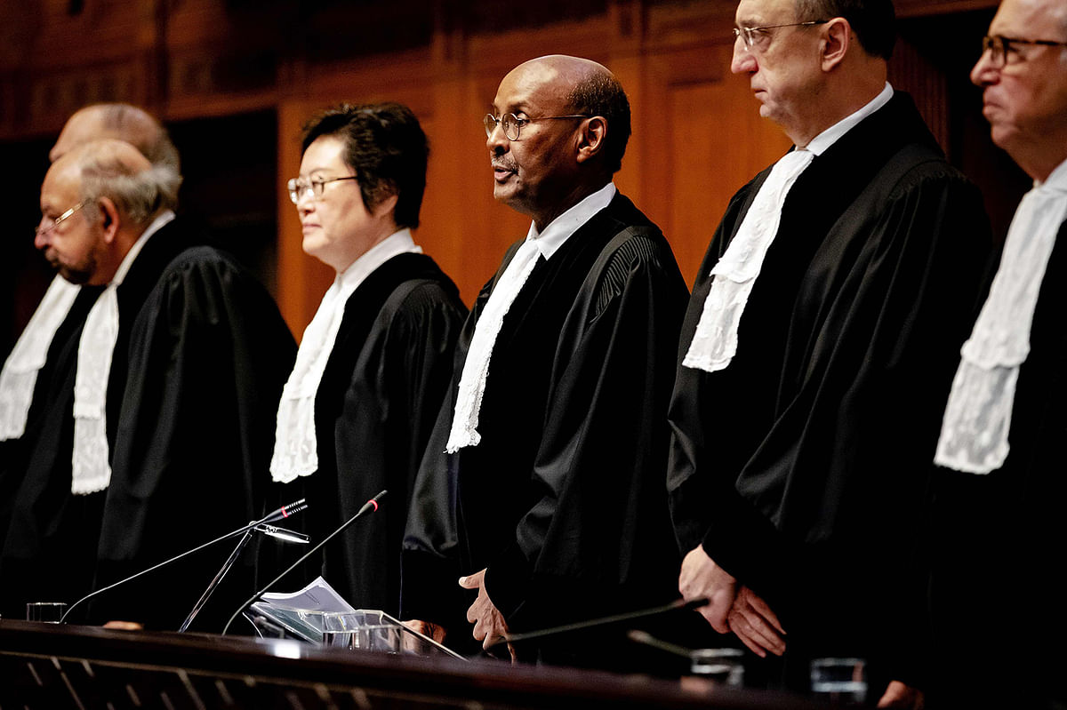 President of the International Court of Justice, Abdulqawi Ahmed Yusuf (C) speaks during the ruling of the International Court of Justice in The Hague, on 23 January, 2020 in the lawsuit filed by The Gambia against Myanmar in which Myanmar is accused of genocide against Rohingya Muslims. Photo: AFP