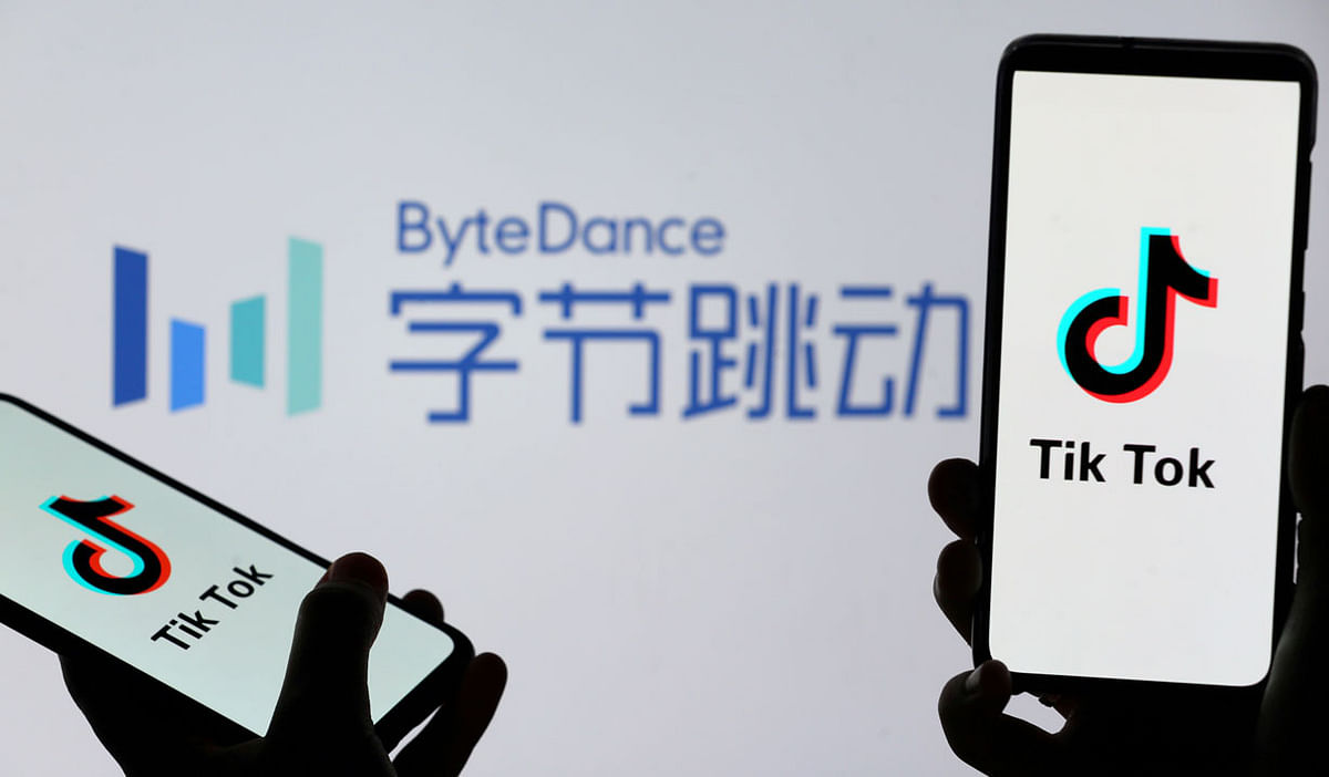Tik Tok logos are seen on smartphones in front of a displayed ByteDance logo in this illustration taken on 27 November 2019. Reuters File Photo