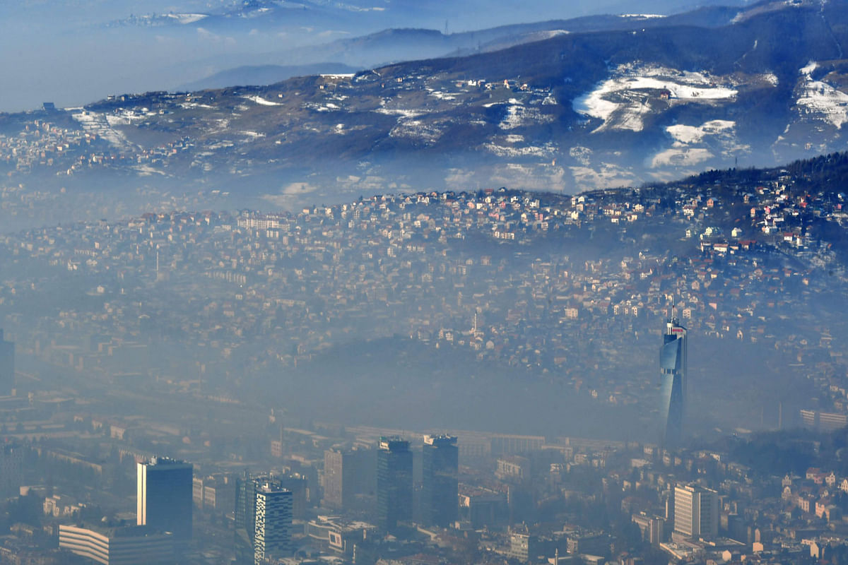 A photograph taken on 14 January 2020, shows a cloud of pollution over the city of Sarajevo. Photo: AFP