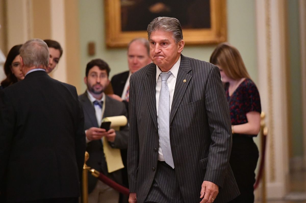 US Democratic Senator from West Virginia Joe Manchin departs at the end of today`s proceedings in the Senate impeachment trial of US president Donald Trump at the US Capitol on 24 January 2020 in Washington, DC. Photo: AFP