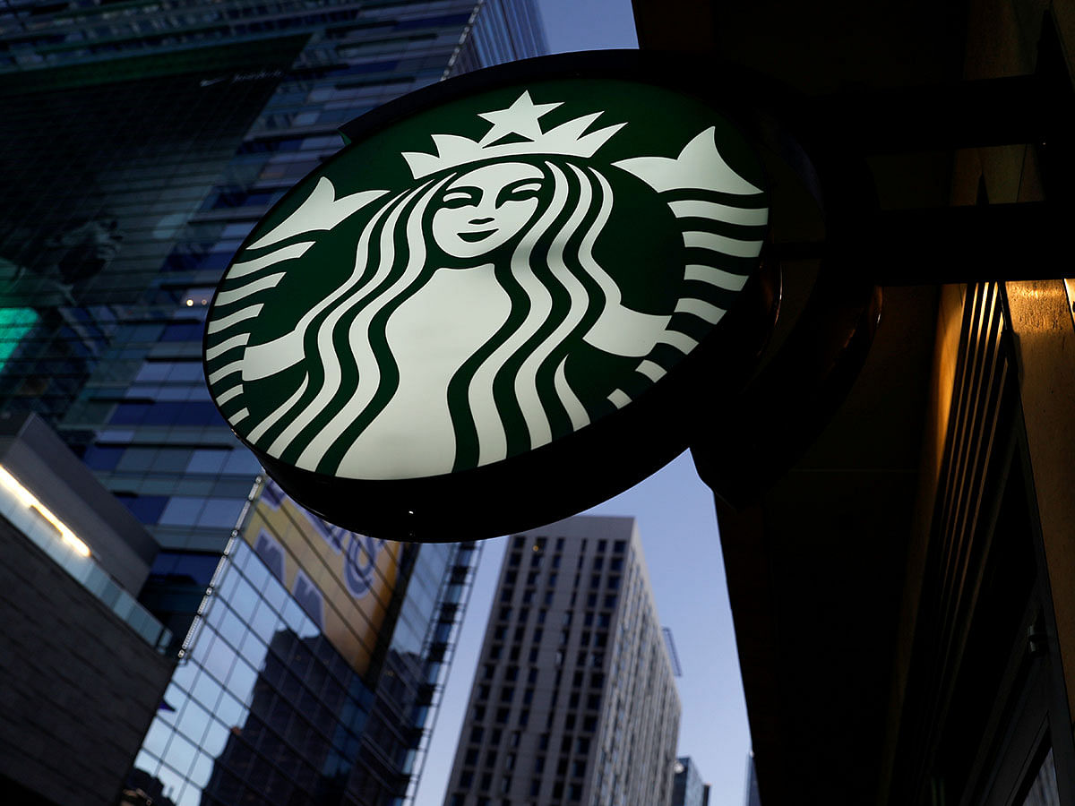 A Starbucks sign is show on one of the companies stores in Los Angeles, California, US on 19 October 2018. Reuters File Photo
