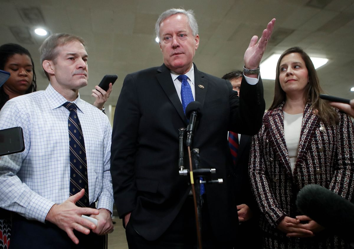 Republican Mark Meadows (R-NC), C, Republican Jim Jordan (R-OH), L, and  Elise Stefanik (R-NY) gather at a news conference on Capitol Hill after impeachment trial proceedings against President Donald Trump adjourned for the day on 25 January in Washington, DC. Photo: AFP
