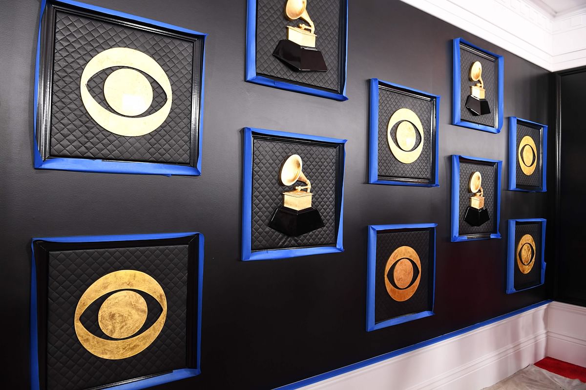 The CBS and Grammy logos are seen on a backdrop as the celebrity arrival area is being set up ahead of the 62nd Annual Grammy awards at LA Live, in Los Angeles, California, on 24 January. Photo: AFP