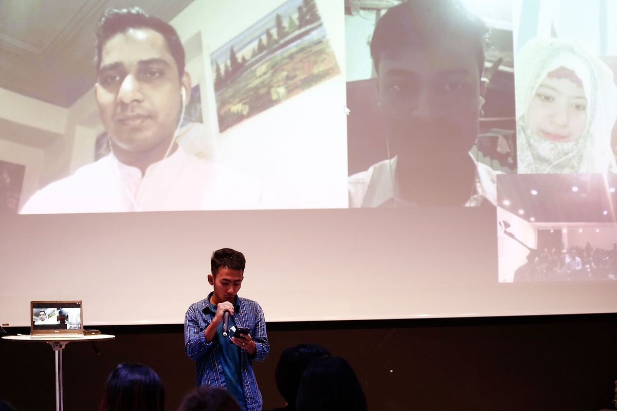 This photo taken on 25 January shows Rohingya Muslim poets reciting poems via a video link during the `Poetry for Humanity` event in Yangon. Photo: AFP
