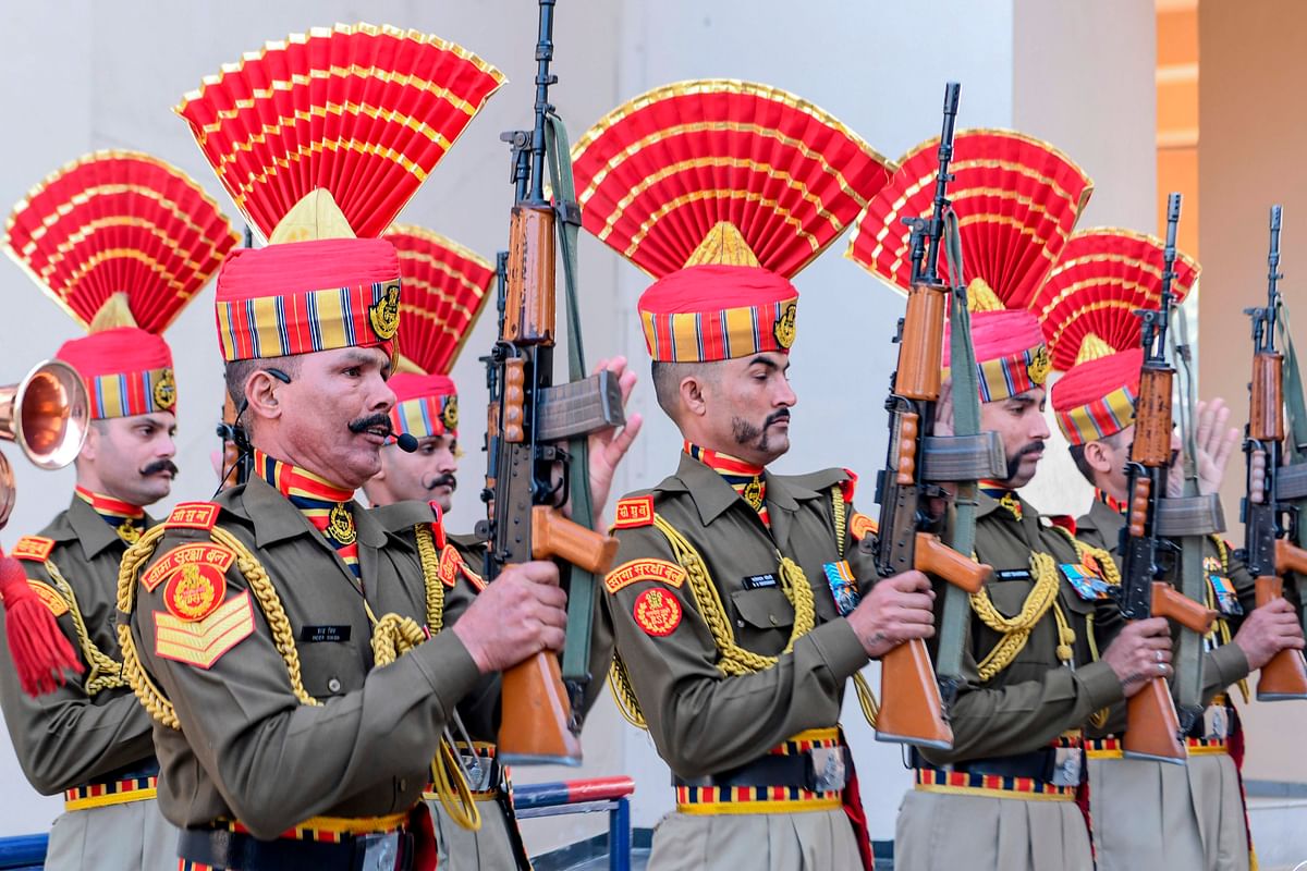 Border Security Force (BSF) personnel perform during a flag hosting ceremony to celebrate the Republic Day at the India-Pakistan Wagah border post, some 35 kms from Amritsar on 26 January 2020. Photo: AFP