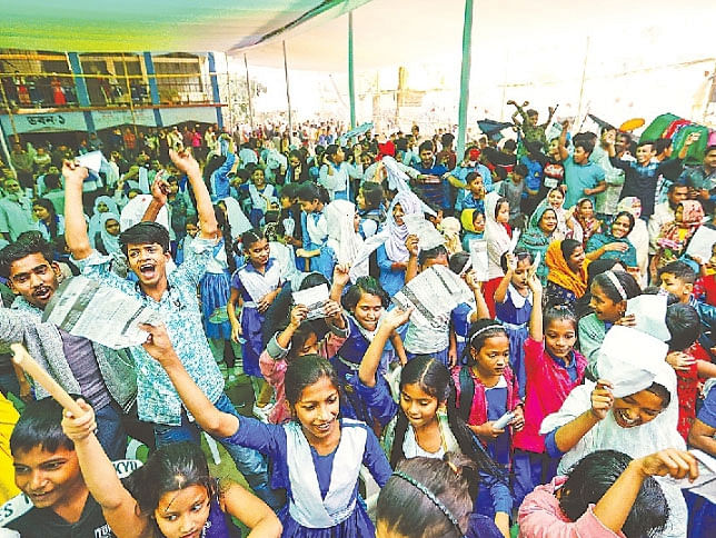 Students and others were holding leaflets at Awami League mayor candidate Atiqul Islam`s rally on a playground of Kalachandpur Government Primary School on Saturday. Photo: Sajid Hossain