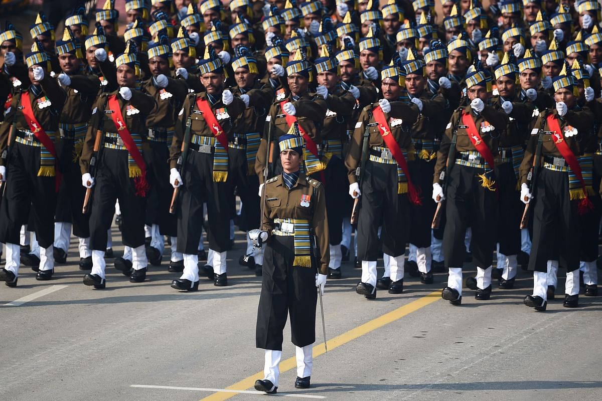 Indian Army captain Tania Shergill (C) leads an all-male contingent as they march along Rajpath during the Republic Day parade in New Delhi on 26 January 2020. Photo: AFP