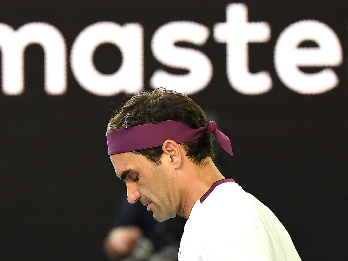 Switzerland`s Roger Federer reacts after winning against Tennys Sandgren of the US during their men`s singles quater-final match on day nine of the Australian Open tennis tournament in Melbourne on January 28, 2020.