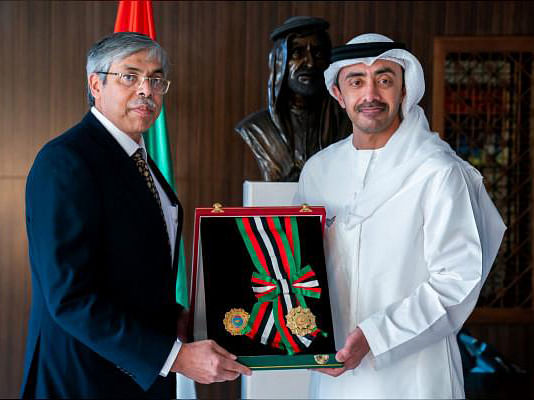 Bangladesh ambassador Muhammad Imran (L) is conferred with UAE Medal of Independence. Photo: Collected