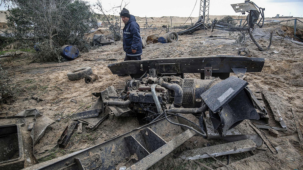 A Palestinian man inspects the site of an Israeli airstrike in Rafah in the southern Gaza Strip, on 31 January. Photo: AFP