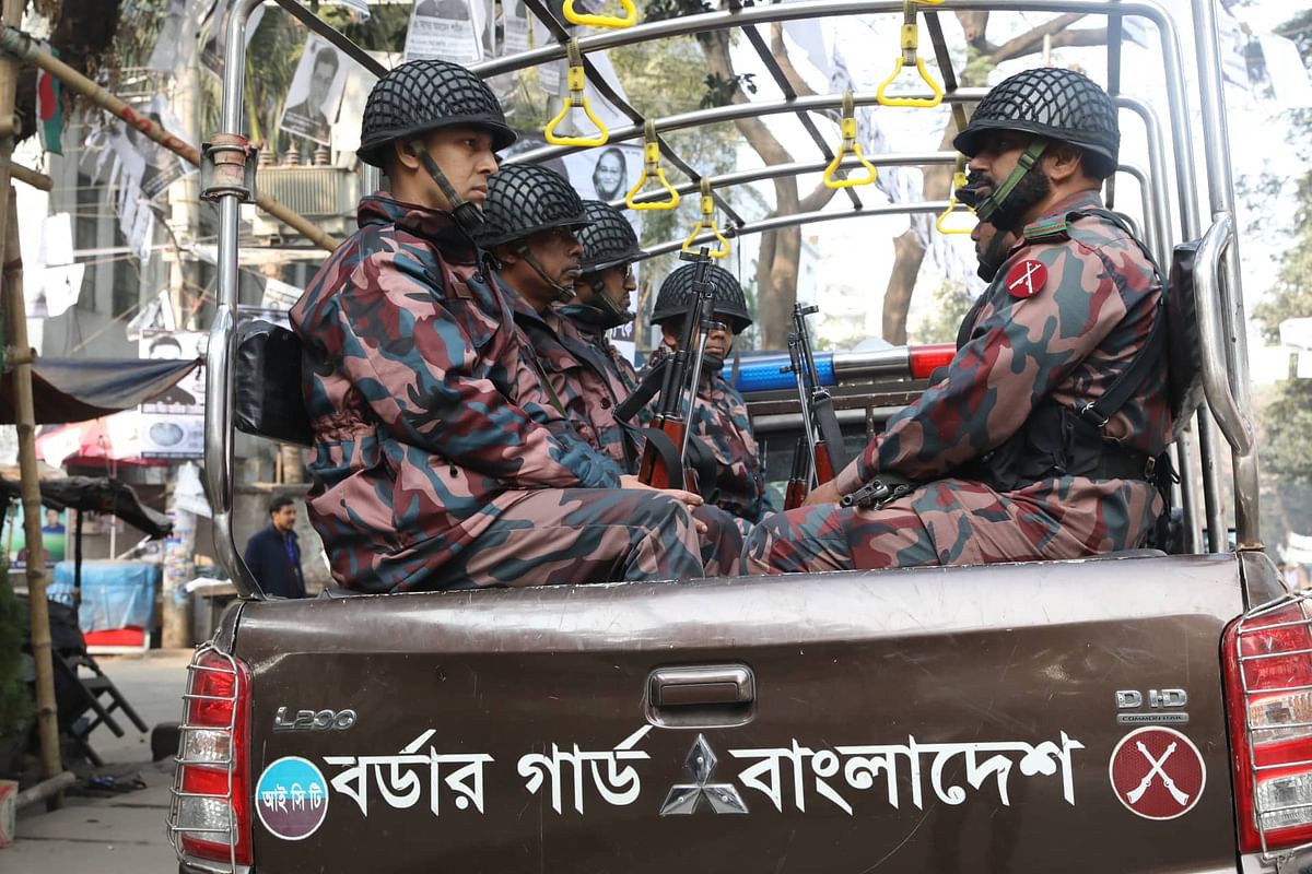 Members of Border Guard Bangladesh (BGB) patrol along the road at City Corporation Market, Bakshi Bazar during the city corporation elections on 1 February 2020. Photo: Abdus Salam