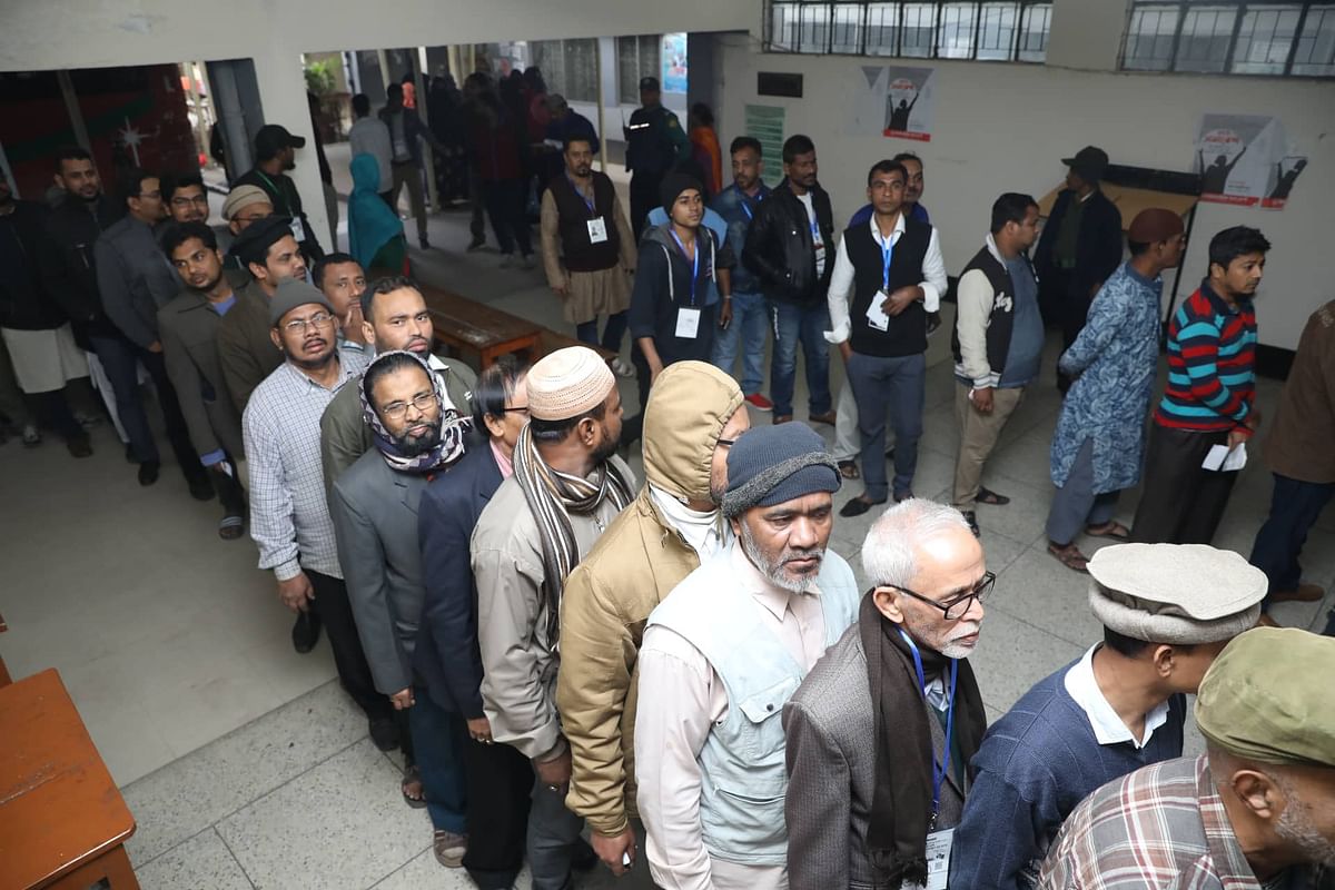 Men in a queue at Badrunnesa Government Girls’ College in Dhaka to cast their votes in the ongoing Dhaka city poles on 1 February 2020. Photo: Abdus Salam