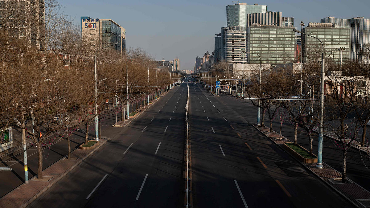 A deserted street is seen in Beijing on 3 February, 2020. A virus similar to the SARS pathogen has killed more than 300 people in China and spread around the world since emerging in a market in the central Chinese city of Wuhan. Photo: AFP