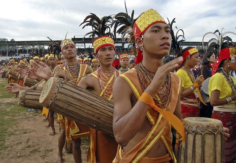 A group of Garo tribal men beat drums to establish a new world record of drum assembles at Shillong, the capital of India`s northeastern state of Meghalaya, on 28 October 2006. Photo: Reuters