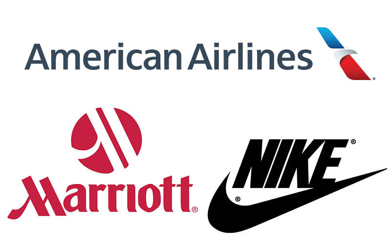 Logos of American Airlines, hotel giant Marriott International and footware maker Nike