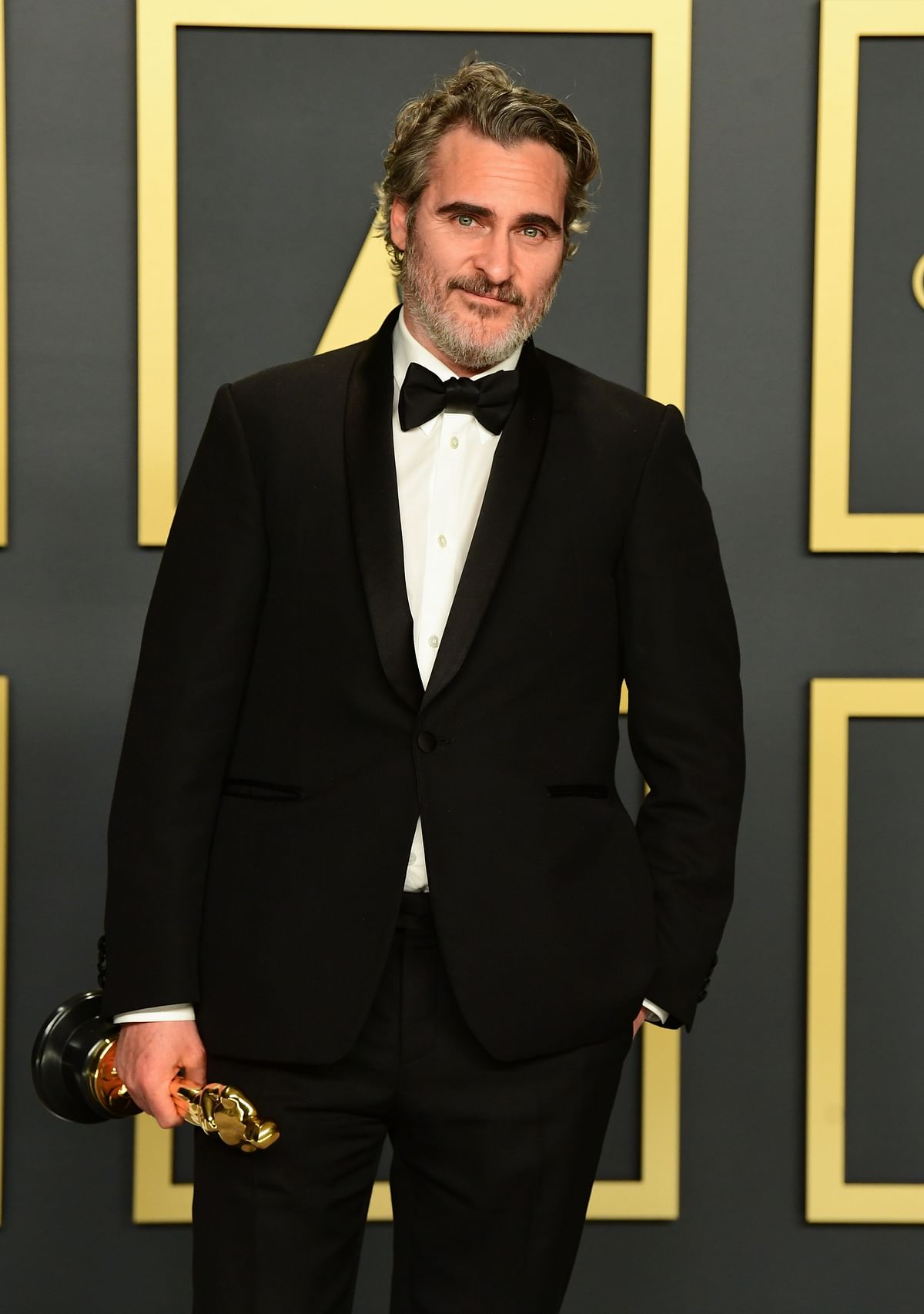 US actor Joaquin Phoenix poses in the press room with the Oscar for Best Actor for `Joker` during the 92nd Oscars at the Dolby Theatre in Hollywood, California on 9 February, 2020. Photo: AFP