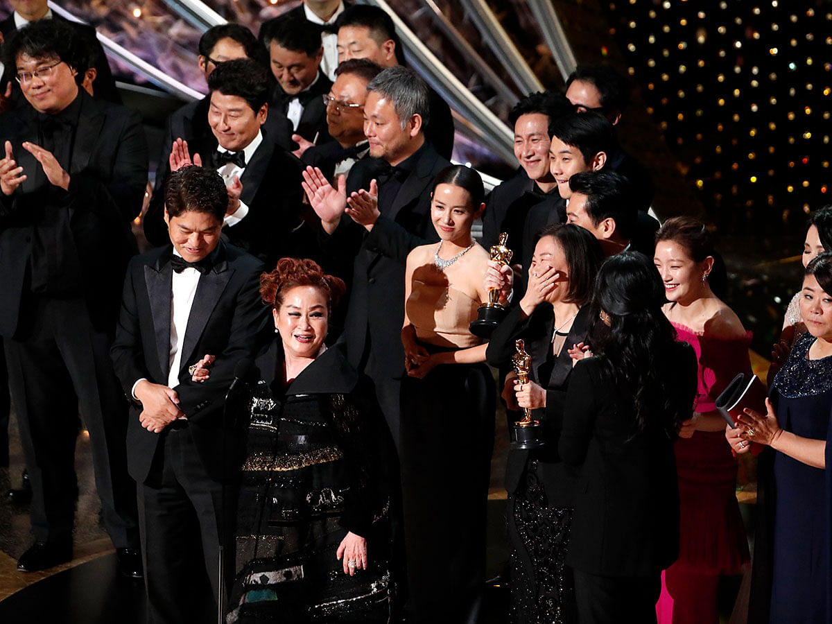 Miky Lee, Kwak Sin Ae and Bong Joon Ho react after winning the Oscar for Best Picture for ‘Parasite’ at the 92nd Academy Awards in Hollywood, Los Angeles, California, US, 9 February 2020. Photo: Reuters