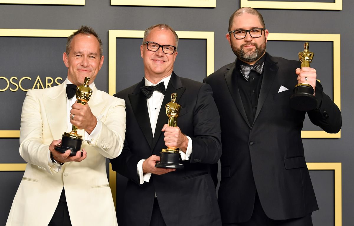 Filmmakers Jonas Rivera, Mark Nielsen and Josh Cooley, winners of the Animated Feature Film award for Toy Story 4, pose in the press room during the 92nd Annual Academy Awards at Hollywood and Highland on 9 February 2020 in Hollywood, California. Photo: AFP