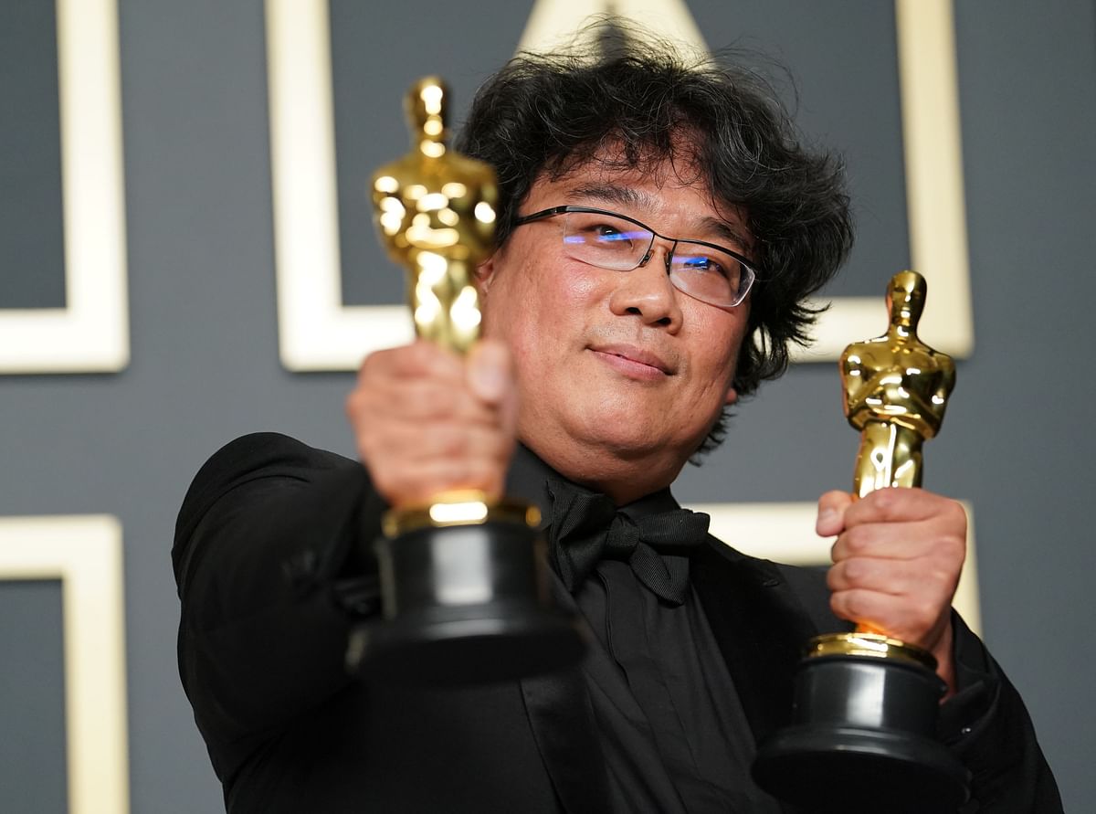 Bong Joon-ho, winner of the Original Screenplay, International Feature Film, Directing, and Best Picture award for Parasite, poses in the press room during the 92nd Annual Academy Awards at Hollywood and Highland on 9 February 2020 in Hollywood, California. Photo: AFP