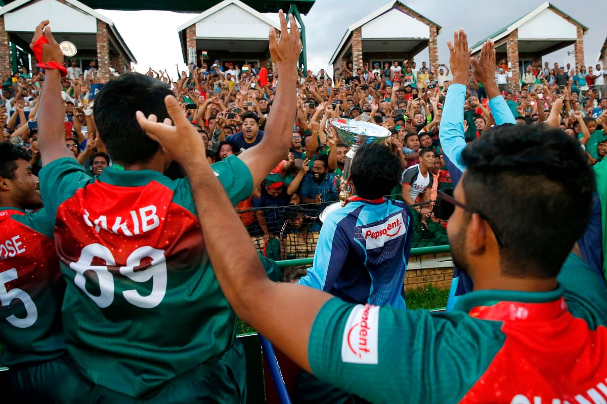 The Bangladesh cricket team celebrate with supporters after winning the ICC Under-19 World Cup cricket finals between India and Bangladesh at the Senwes Park, in Potchefstroom, on 9 February, 2020. Photo: AFP