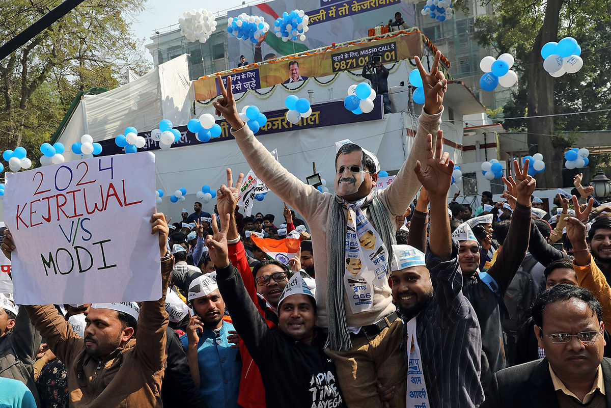 Supporters of Aam Aadmi Party (AAP) celebrate at the party headquarters in New Delhi, India, on 11 February 2020. Photo: Reuters